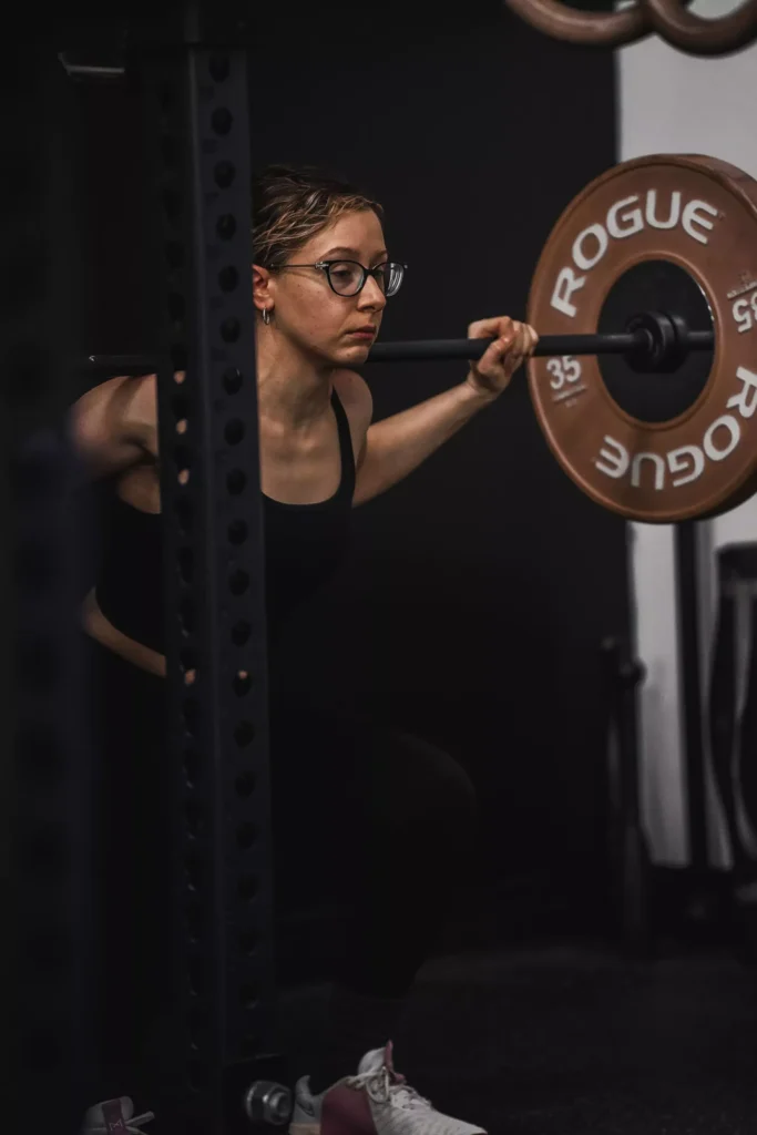 Female personal trainer coaching client in Brooklyn